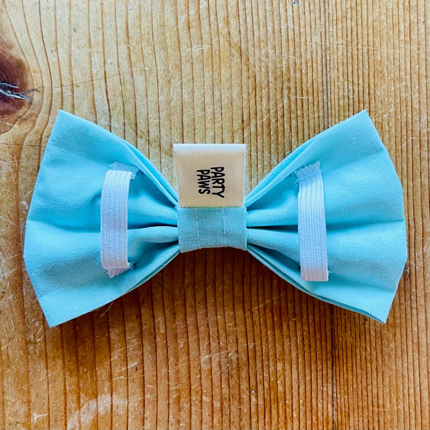 Hundefliege mint Rückseite